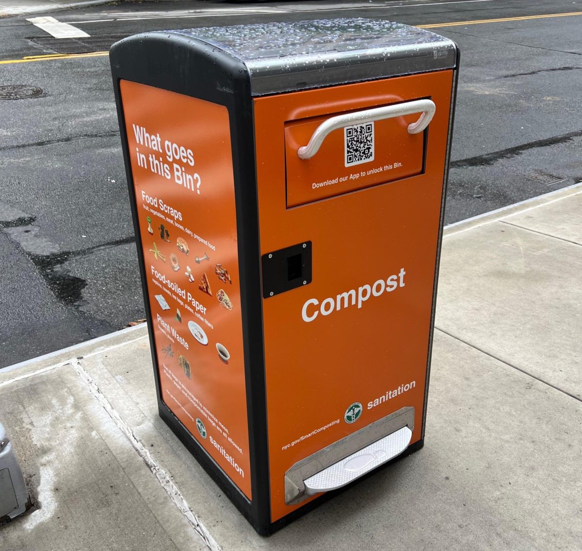 The citys new orange curbside compost bins.  