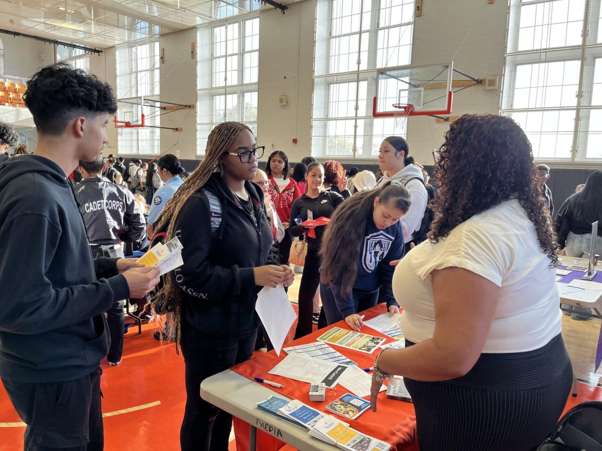 TCA senior Aimee Soriano hearing more about Hostos College.  