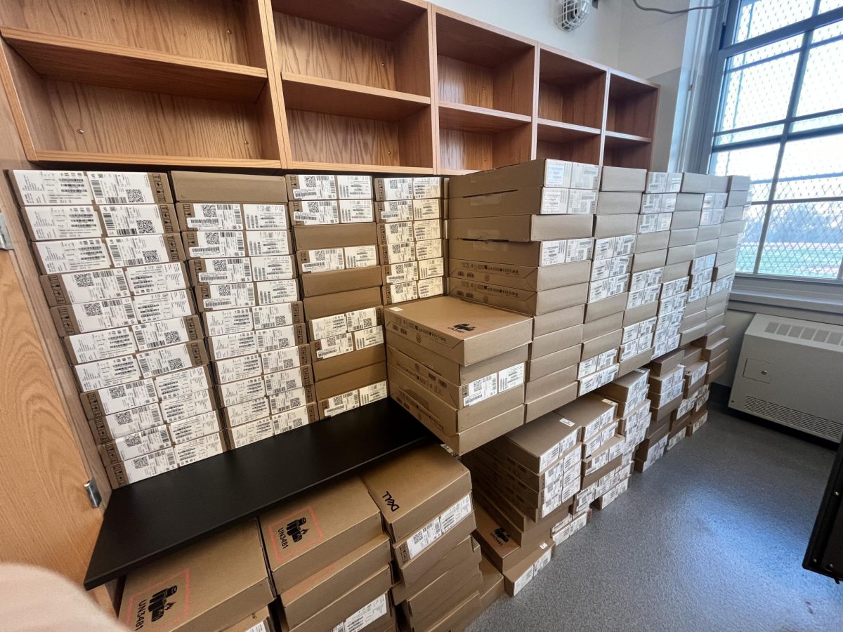 Over three hundred new Chromebooks await TCA students' pick up.
